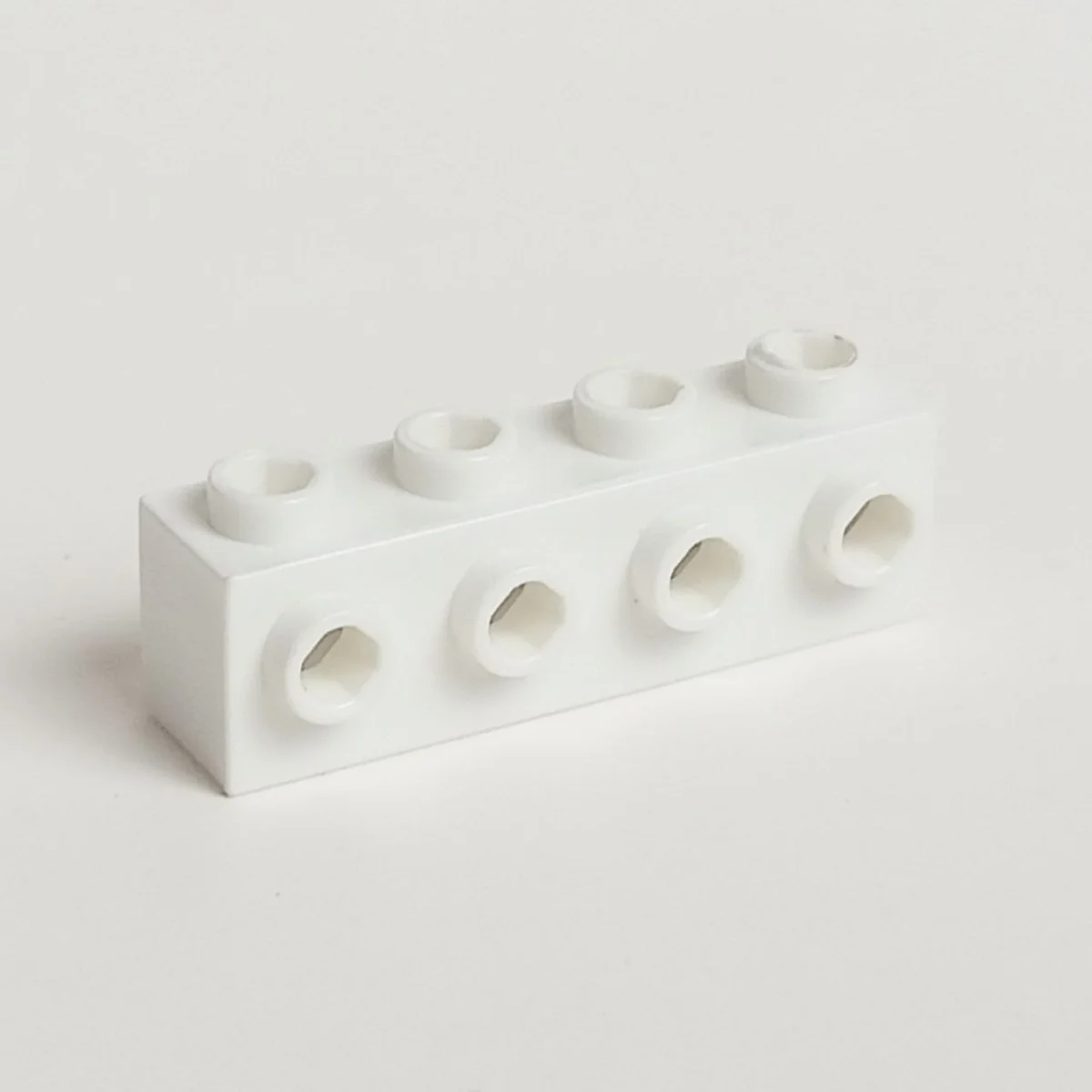 Brick Modified 1 x 4 with side studs in White