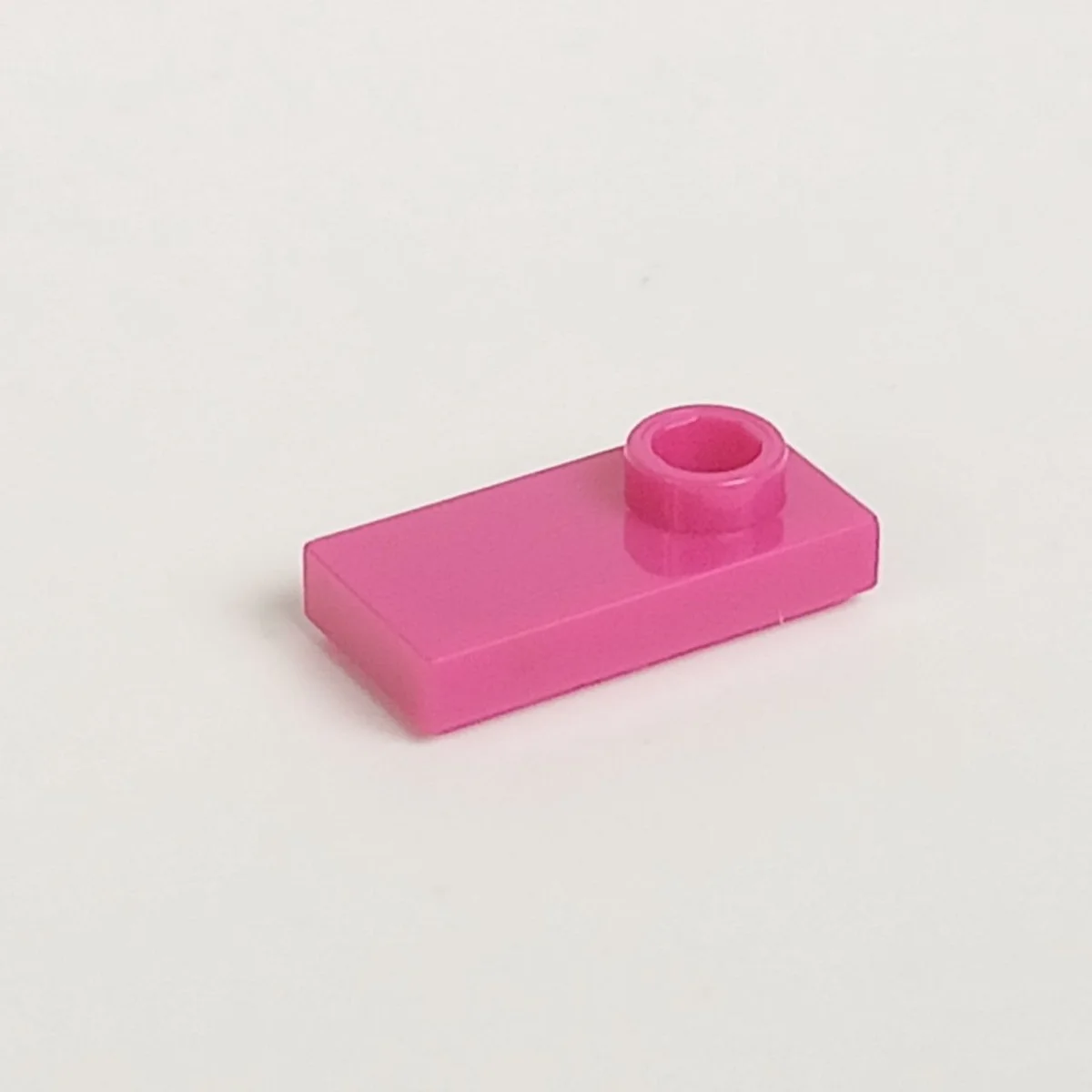 Plate Modified 1 x 2 with one stud, offset in Pink, Barbie