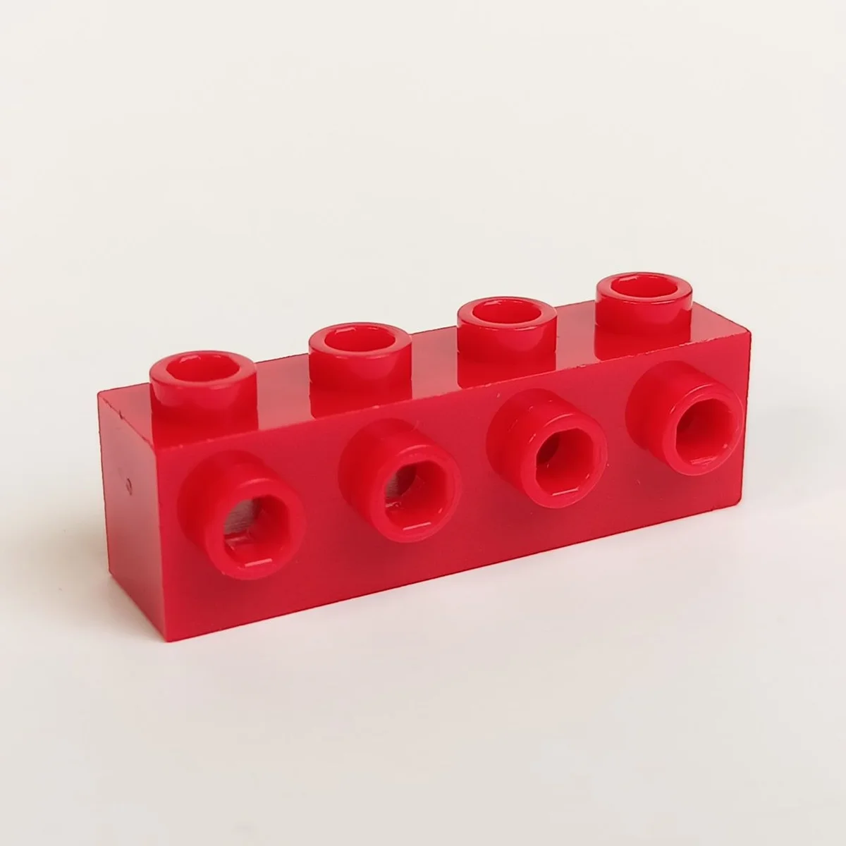 Brick Modified 1 x 4 with side studs in Red, Flame