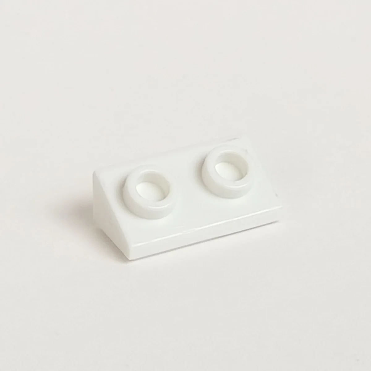 Slope brick 36 2 x 1 with open studs on slope in White
